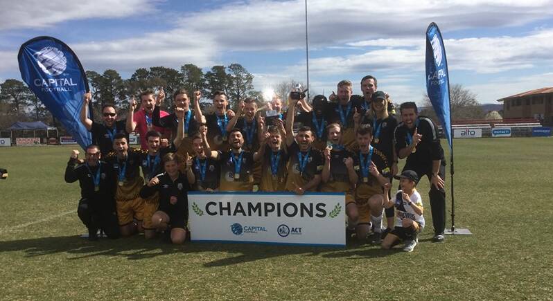 CHAMPIONS: The Wagga City Wanderers under-20s celebrate winning the grand final over ANU. Picture: Capital Football