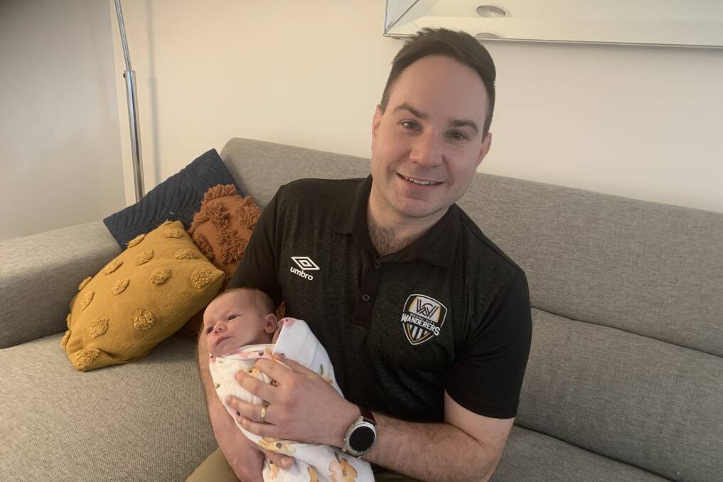PLENTY OF RESPONSIBILITY: New Wagga City Wanderers president with two-week-old daughter Ella. Picture: Jon Tuxworth