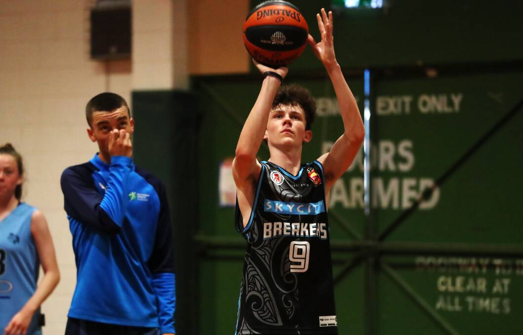 HANDY TIPS: Cootamundra's Matthew Walsh, 16, puts up a shot during the clinic. Picture: Emma Hillier