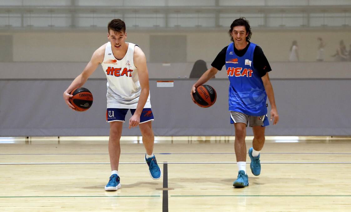 RETURNED: Wagga Heat guards Chaz Bishop and Cam McPherson. Picture: Les Smith