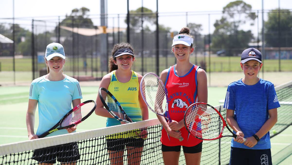 Jessica Lee, 14, Clio Campbell, 12, Leila, Campbell, 13 and Angus Lee, 12 at Wagga Tennis Centre on Monday. Picture: Emma Hillier