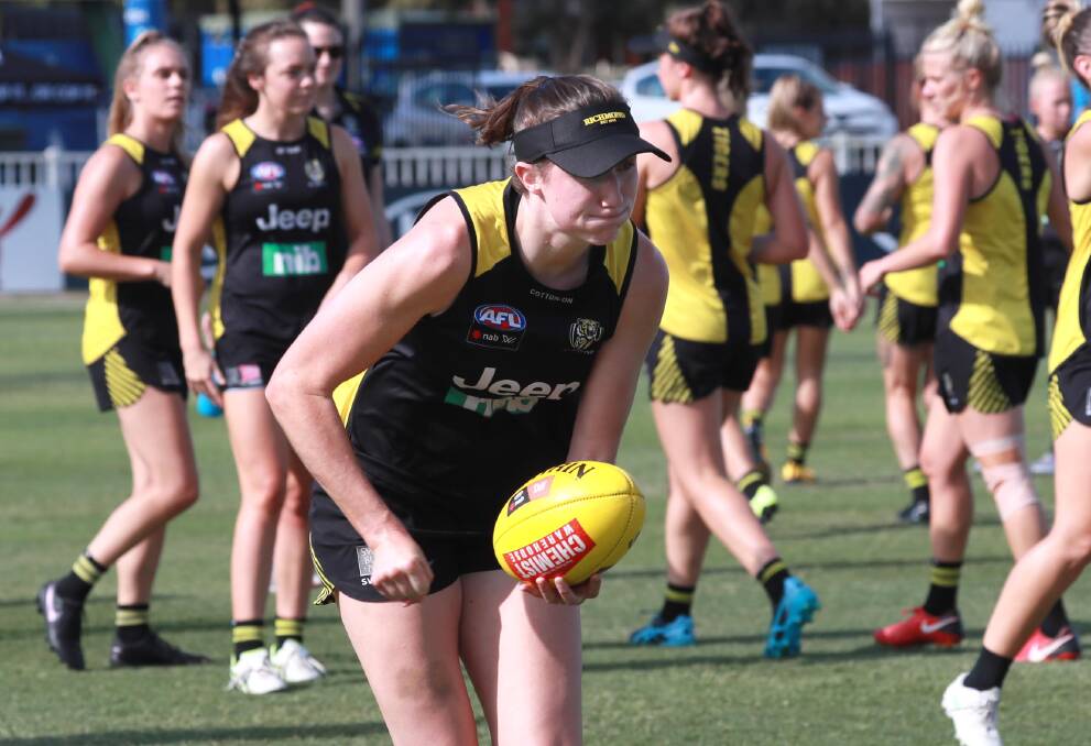 WINNING FEELING: Wagga product Rebecca Miller
is hopeful a long-awaited AFLW win with Richmond
is just around the corner. Picture: Les Smith