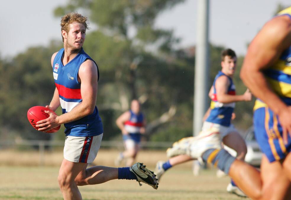 BACK HOME: Matt Ness looks for an option playing for Turvey Park against MCUE in 2012. Picture: Sara Schneider