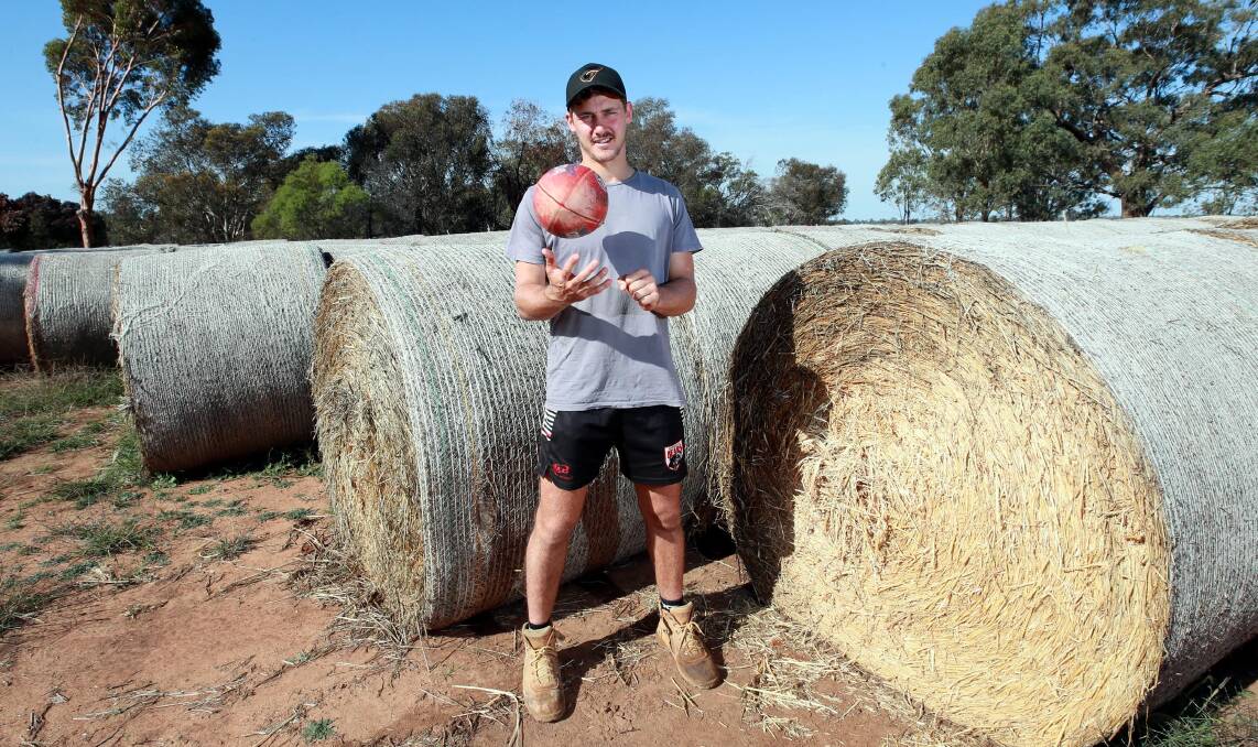 BACK AT IT: GWS Giants player Harry Perryman at his family's Collingullie property in April. Picture: Les Smith