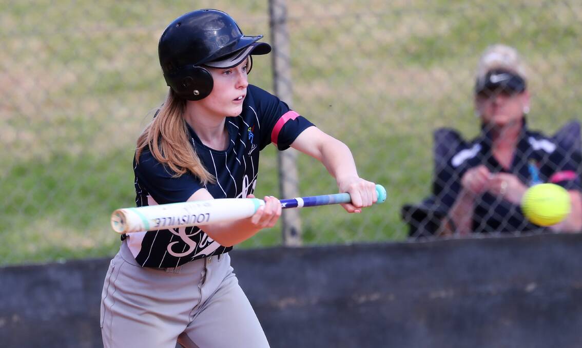 Saints' Jess Wilde executes a bunt during their loss to the Warriors on Saturday. Picture: Emma Hillier