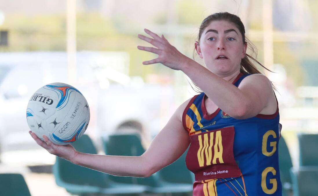 FOCUS: GGGM's Alice Kenny looks for passing options during Saturday's loss to Coolamon. Picture: Les Smith