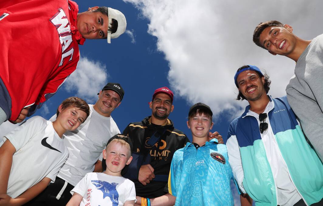 ROLE MODELS: Local youngsters (from left) Jairlan Simpson, 14, Tate Pauls, 9, James Kelly, 6 and Jack Hardy, 14 with NRL and AFL stars James Roberts, Cody Walker, Allen Christensen and Sean Lemmons at Sunday's Yandarra Festival in Wagga. Picture: Emma Hillier