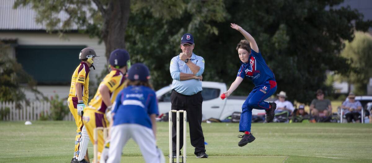 SHOWDOWN: St Michaels Red's Alexander Kelly sends down a delivery during the under-13 grand final against Lake Albert Gold. Picture: Madeline Begley 