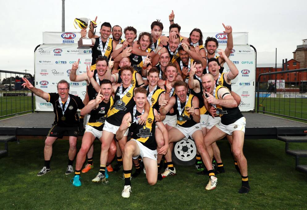 CHAMPIONS: The Wagga Tigers secured their second piece of silverware in as many years after winning the AFL Riverina Championship grand final. Picture: Les Smith