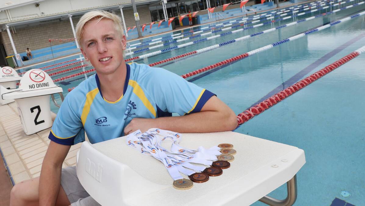 MEDAL HAUL: Wagga swimmer Jamie Mooney cleaned up at the NSW Senior State Age Championships, his haul including four gold medals. Picture: Les Smith