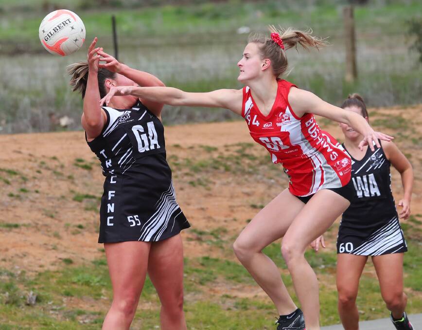 Ashleigh O'Leary jostles with The Rock-Yerong Creek's Lily Wild during a game last year. Picture: Emma Hillier