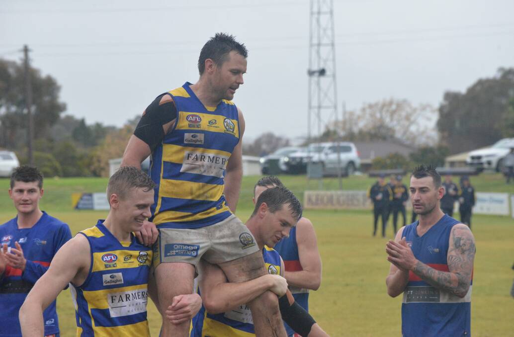 MILESTONE: Trent Cohalan gets carried off after the Goannas marked his 300th club game with a win. Picture: MCUE