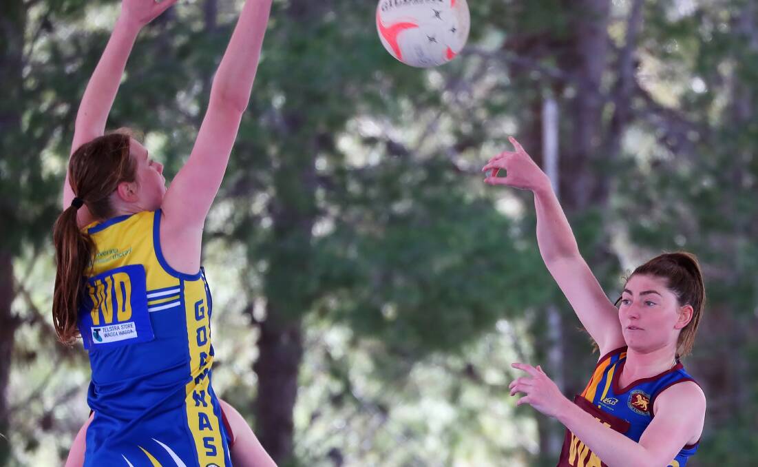 EXCITED: Ganmain-Grong Grong Matong's Alice Kenny fires off a pass during last week's clash with MCUE. Picture: Emma Hillier