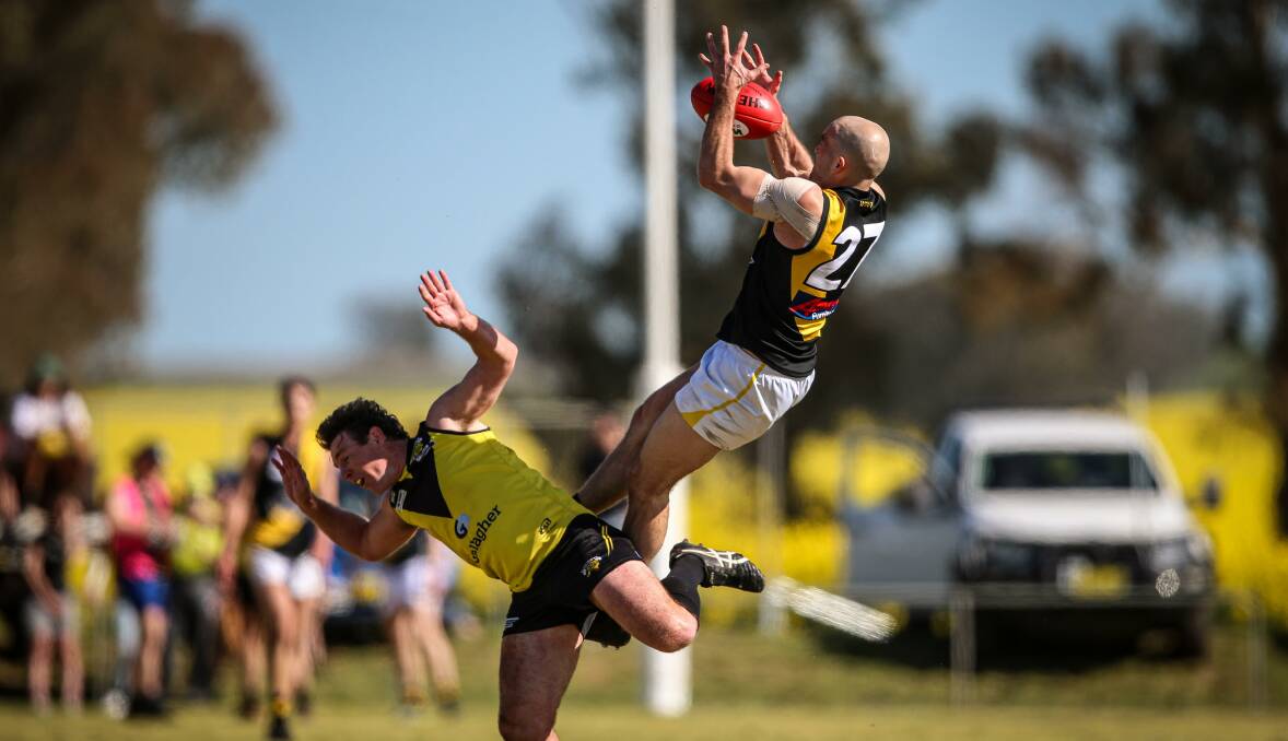 FLYING HIGH: Wagga Tiger Shaun Campbell makes a spectacular leap during his side's win over Osborne on Saturday. Picture: James Wiltshire/The Border Mail