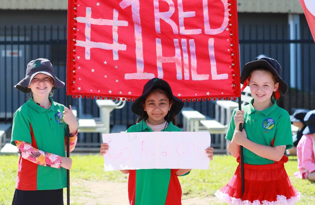 CHEER SQUAD: Red Hill house members Cara Stanton, 9, Nancy Awad, 8 and Annanelle Hibbard, 9. Picture: Les Smith