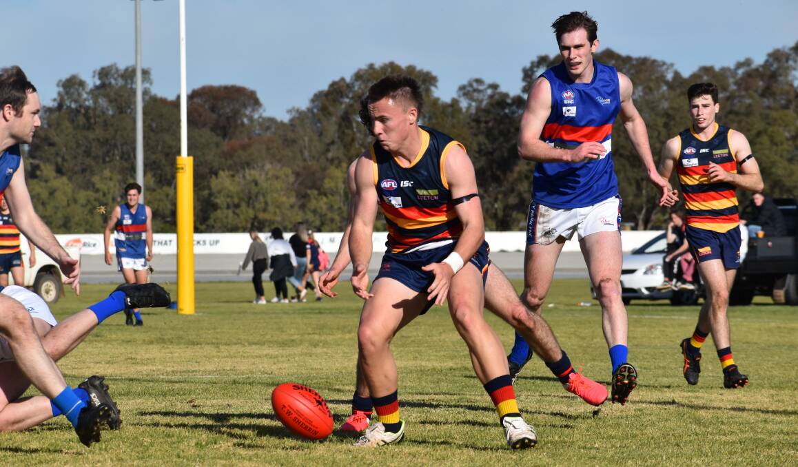 Leeton-Whitton youngster Coopa Steele attacks the ball against Turvey Park this season. Picture: Liam Warren 