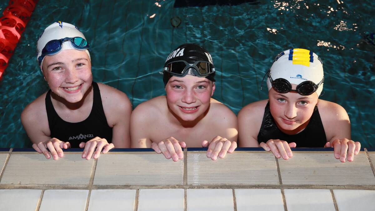 Wagga swimmers Sienna Heffernan, 12, Noah Stirton, 11 and Evie Perry, 11. Picture: Les Smith