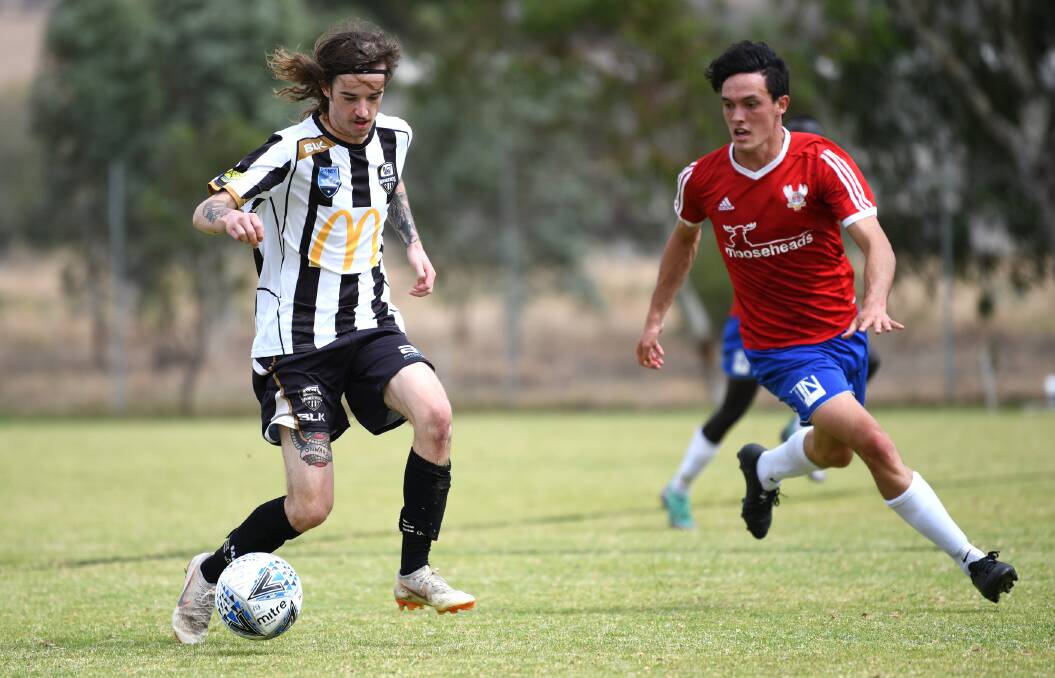 SENT OFF: Wanderers' Caylum Barber (left, pictured playing against Canberra White Eagles in March) was red carded late in Saturday's win at Brindabella. 
