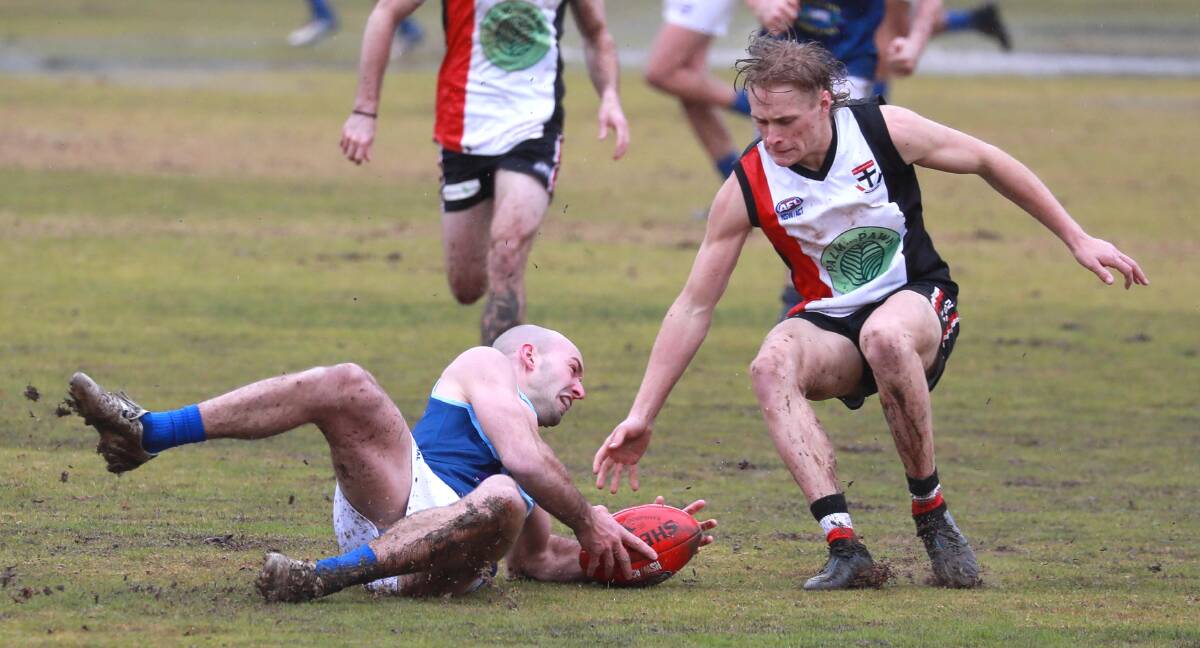 NEW HOPE: North Wagga's Bailey Clark and Barellan's Michael Lovett in action in a Farrer League clash earlier this year. Picture: Les Smith