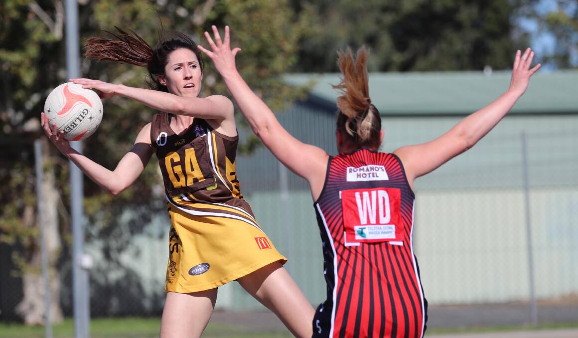 TOUGH LOSS: East Wagga Kooringal's Kelly Byrne looks to find a pass in Saturday's loss to North Wagga Saints. Picture: Les Smith.