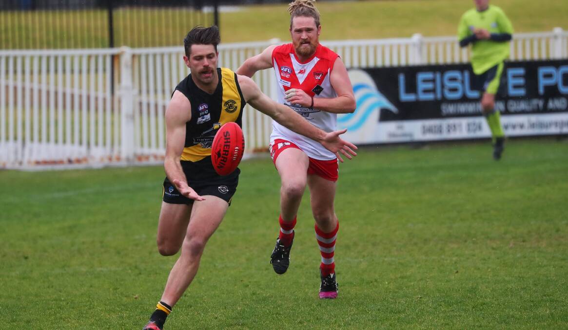 PURPLE PATCH: Wagga Tiger Jock Cornell chases down the ball against Griffith earlier this year. Picture: Emma Hillier