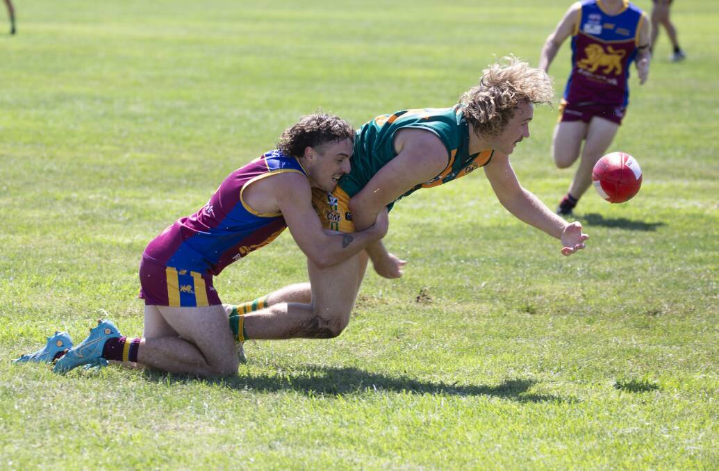 CRUNCH TIME: North Albury's Sam Azzi is tackled by GGGM's Tom Anderson during Sunday's trial at Ganmain Sportsground. Picture: Madeline Begley 