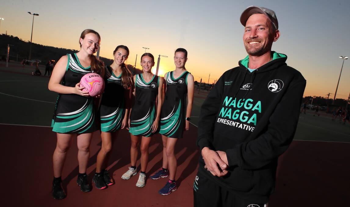: SHOOTING STARS: Netball coach Matt Schofield with 15-years Wagga representative players, (from left) Marni Carroll, Leila Wadley, Alicia Johnson and Claire Herbert. Picture: Les Smith.