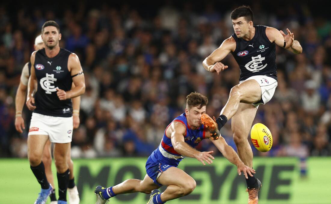JUST REWARD: Matt Kennedy, who has signed a new three year deal with Carlton, gets a kick away during the round two win over Western Bulldogs. Picture: Getty Images