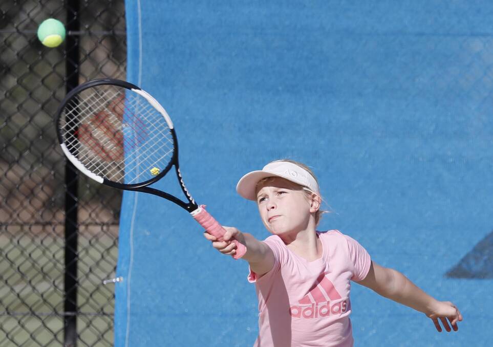 COURT TIME: Wagga nine-year-old Lily Bradshaw reaches for the ball during the Regional Matchplay Series tournament at Jim Elphick Centre last weekend. Picture: Les Smith