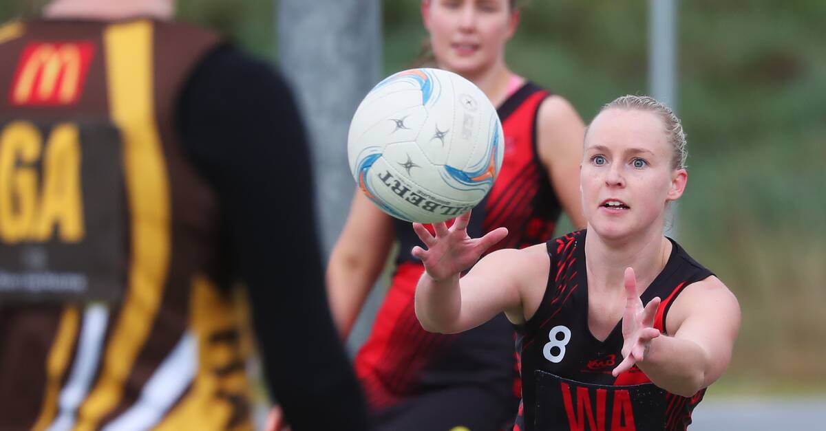 FOCUSED: Marrar's Tara Taylor takes a pass during Saturday's loss to East Wagga Kooringal. Picture: Emma Hillier