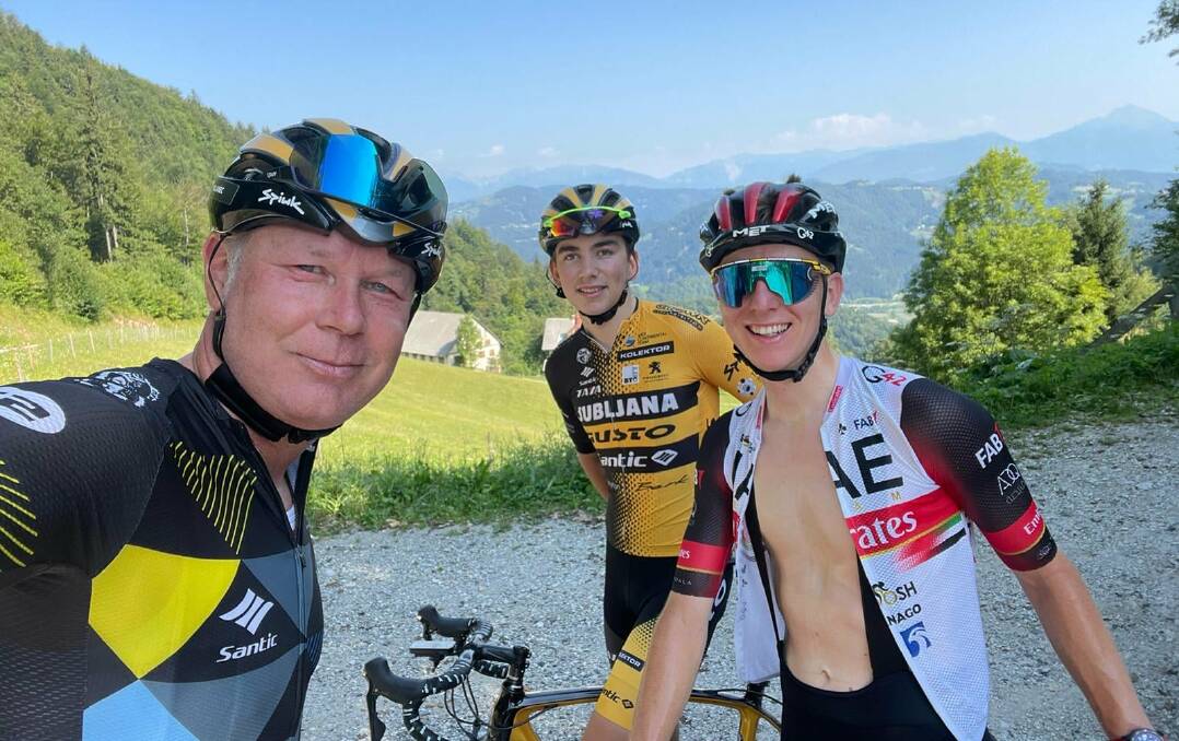 CYCLING ROYALTY: Wagga's Zac Barnhill (centre) with Ljubljana Gusto Santic general manager Tomaz Poljanec and two-time Tour de France winner Tadej Pogacar. Picture: Ljubljana Gusto Santic 
