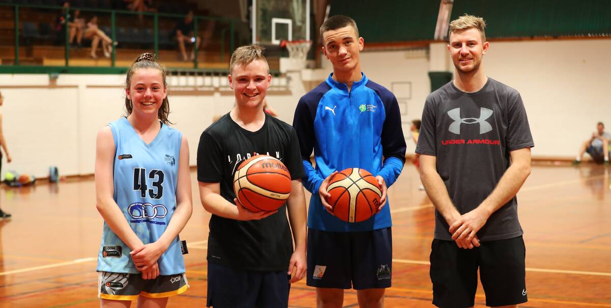 RAISING FUNDS: Skills clinic organiser Zac Maloney (right) with participants Caitlin Quintal, 13, Cooper Seddon, 14 and Jack Bird, 14. Picture: Emma Hillier
