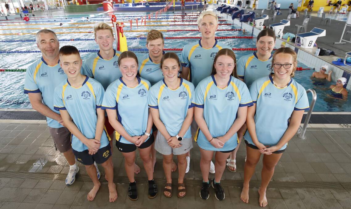 SYDNEY BOUND: Wagga Swim Club members set to swim at next week's state titles: Front (from left) - Gerard Curtis, Georgie Donelan, Chloe Donelan, Natalia Horsley, Trinity Cox. Back (from left) Coach Gennadiy Labara, Isaac Mooney, Kade Knight, Jamie Mooney and Lilly Holtorf. Absent: Ella Creighton, Bailey Figgis, Niane Mulder. Picture: Les Smith
