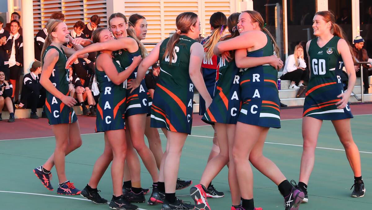 TRAC players celebrate their historic win. Picture: Emma Hillier
