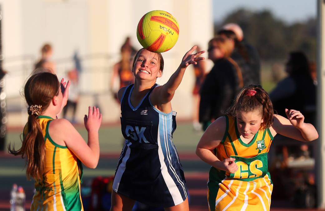 SCHOOL NETBALL: Wagga High's Ella Blay contests the ball in a year 7/8 Tracey Gunson Shield clash against Mount Austin High School last week. Picture: Emma Hillier.