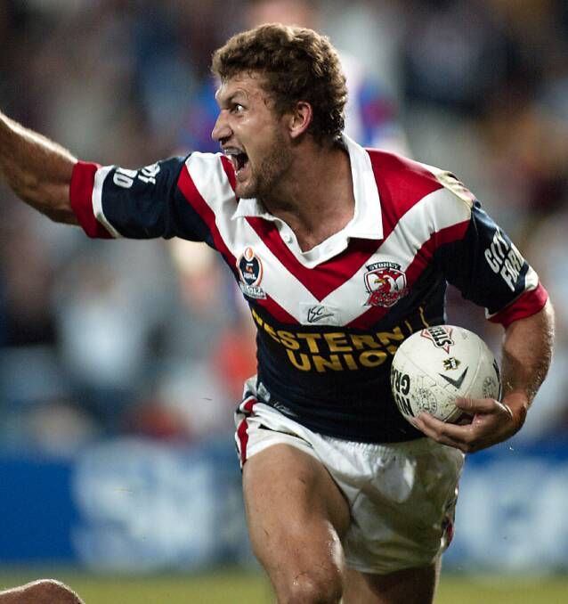 FAIRYTALE ENDING: Brett Mullins celebrates before scoring a try in the Roosters' 2002 grand final win, his last NRL game. Picture: AAP Image/Photosport/Sandra Teddy
