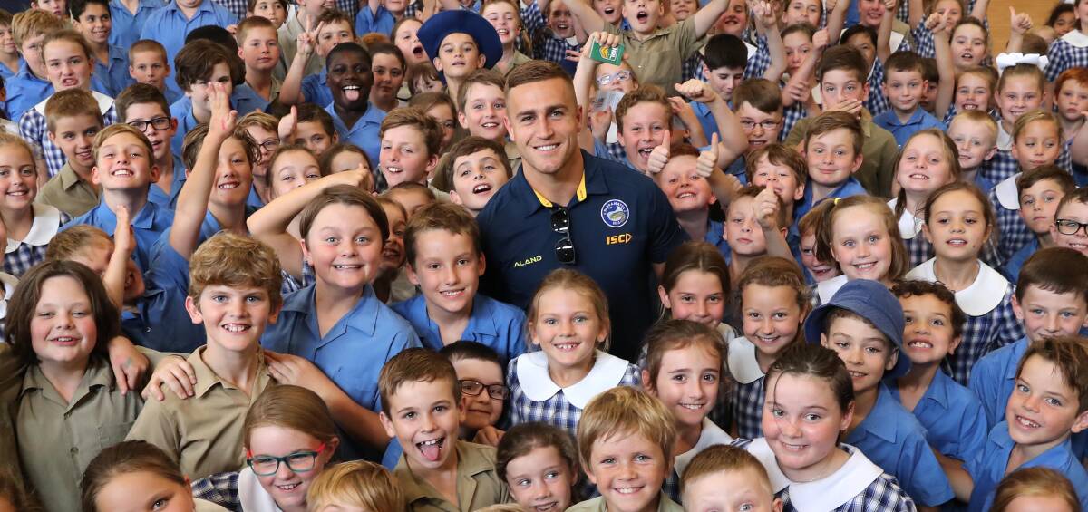 NEW ADDITION: Cameron King at a school visit in Wagga. 
