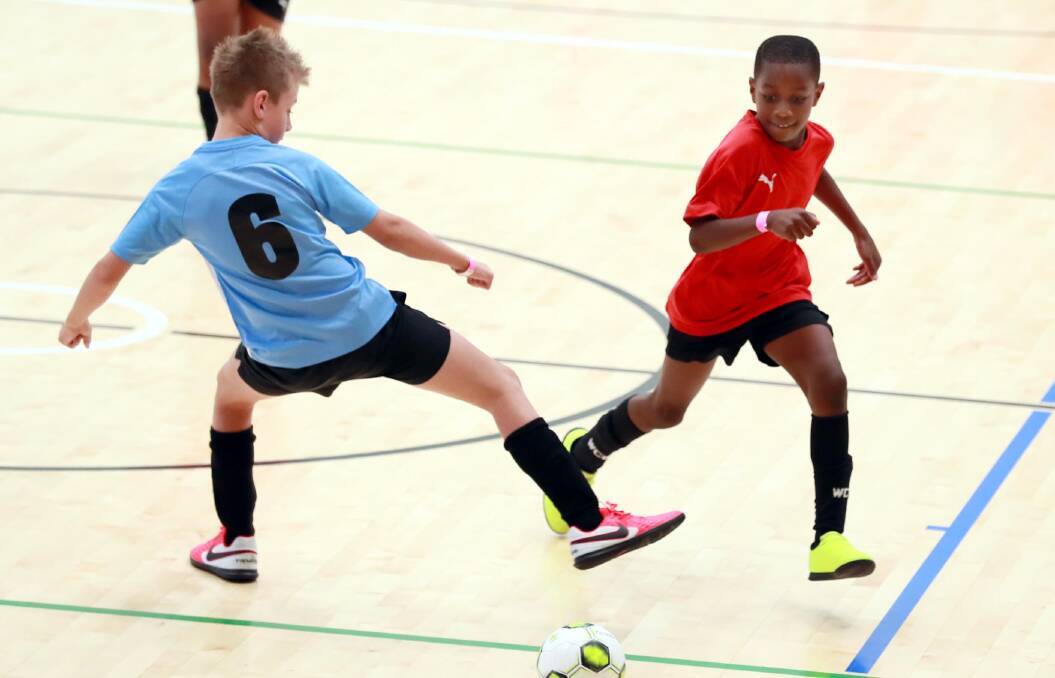 BACK IN ACTION: Bradley Nelson and Ryan Jose during this year's Wagga Futsal Cup. Picture: Les Smith