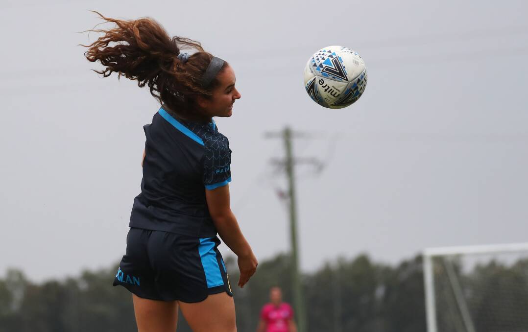 COUNTRY CALLING: Sydney FC's Julia Vignes heads a ball during the W-League champions' visit to Wagga last week for a trial match against Newcastle. Picture: Emma Hillier