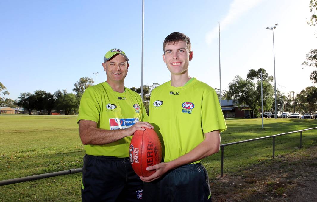 DIFFICULT JOB: Australian Rules umpires Troy Edwards and Braydon McClintock at pre-season training at Apex Park in March last year. Picture: Les Smith 