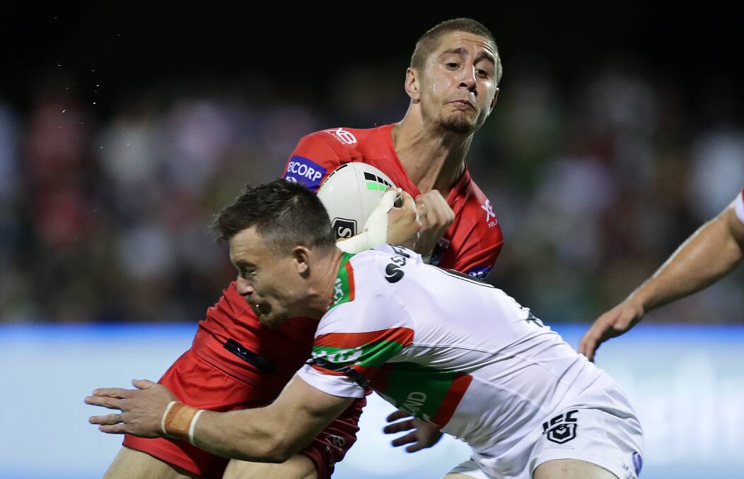 HOLDING PATTERN: Temora product and St George Illawarra back Zac Lomax is tackled by South Sydney's Damien Cook during this year's Charity Shield. Picture: Mark Metcalfe/Getty Images