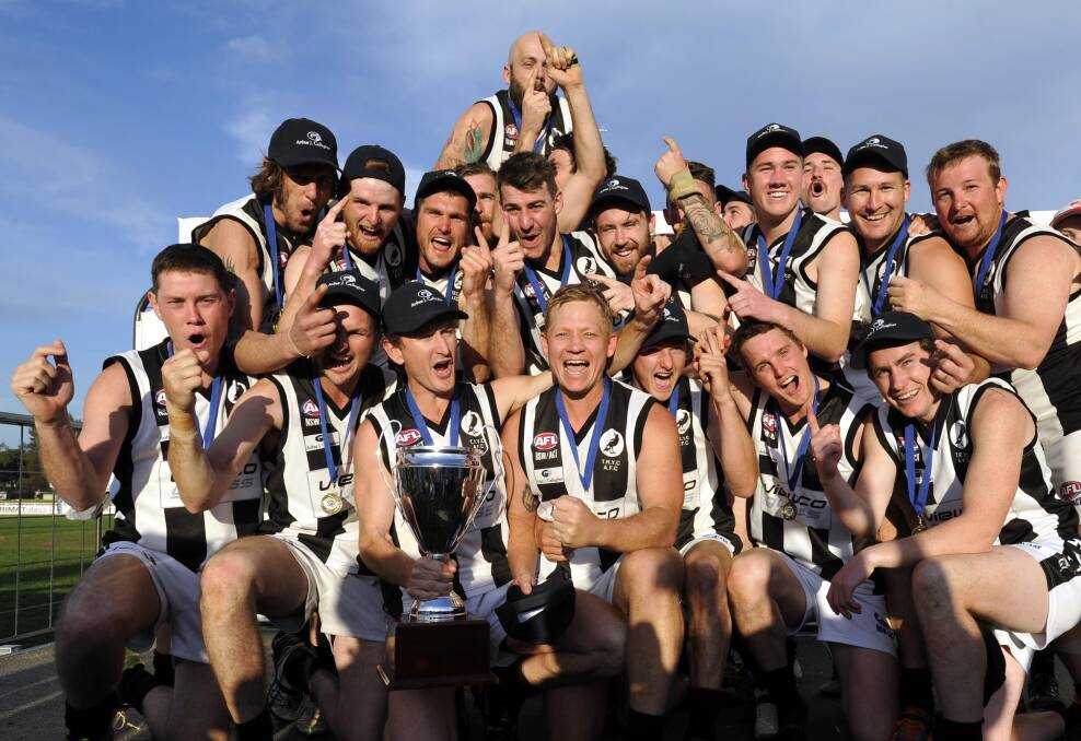 YOU BEAUTY: Tom Yates (back, third from left) after TRYC won the 2015 grand final. Picture: Les Smith