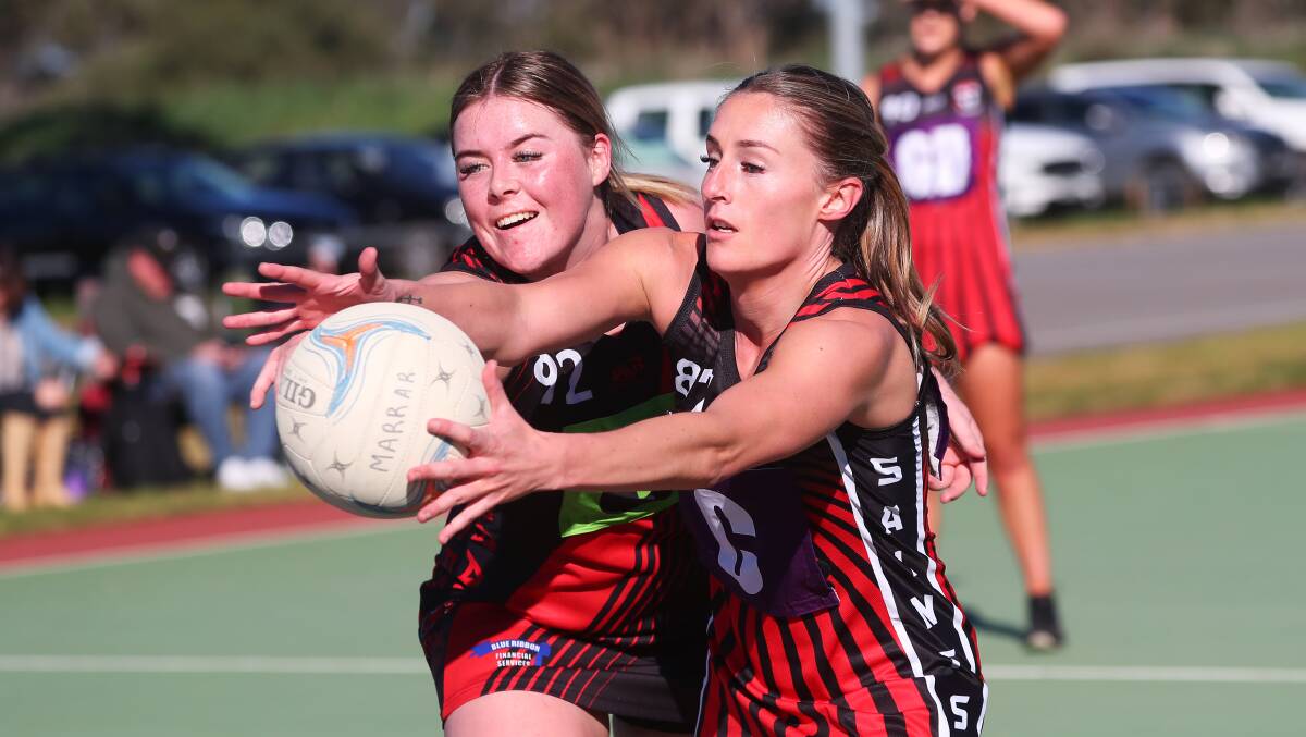 SCRAP: Marrar's Kadison Hofert and North Wagga's Margie Johnson battle for possession during their Farrer League clash on Saturday. Picture: Emma Hillier