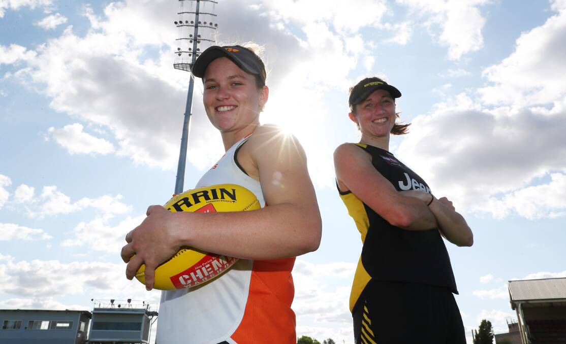 IMPRESSIVE YEAR: Giant Alyce Parker with Richmond's Rebecca Miller before they clashed in last month's AFLW clash in Wagga. 