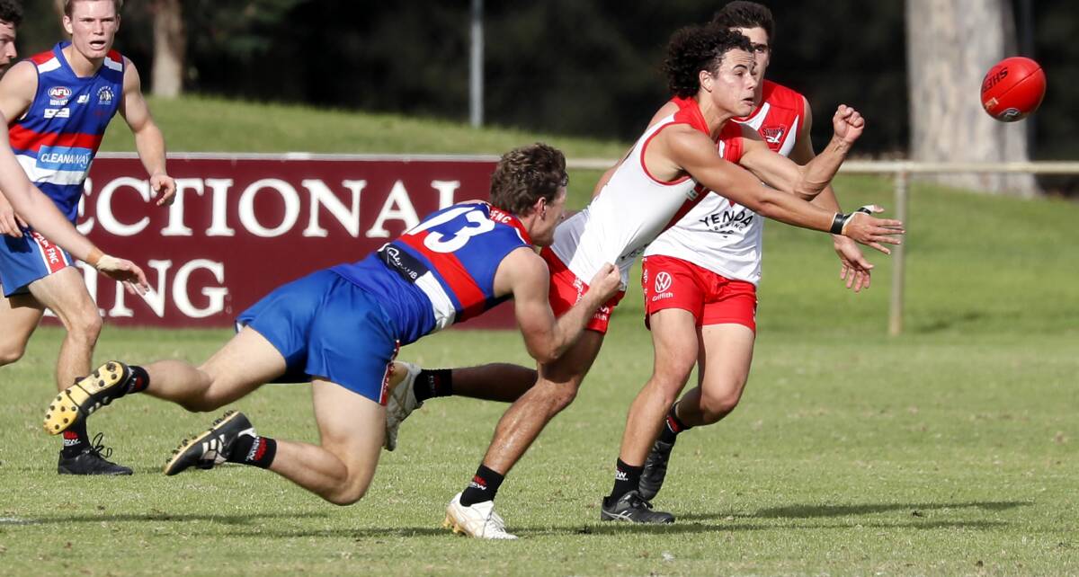 HUNTED: Griffith's Taine Moraschi is tackled by Turvey Park's Stephen Camp. Picture: Les Smith