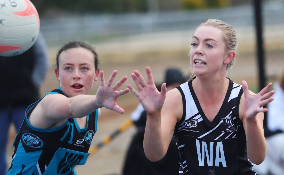 EYE ON THE PRIZE: Northern Jets' Isabelle Gaynor and The Rock-Yerong Creek's Sophie Coates look to grab possession during their Farrer League netball clash on Sunday. Picture: Emma Hillier