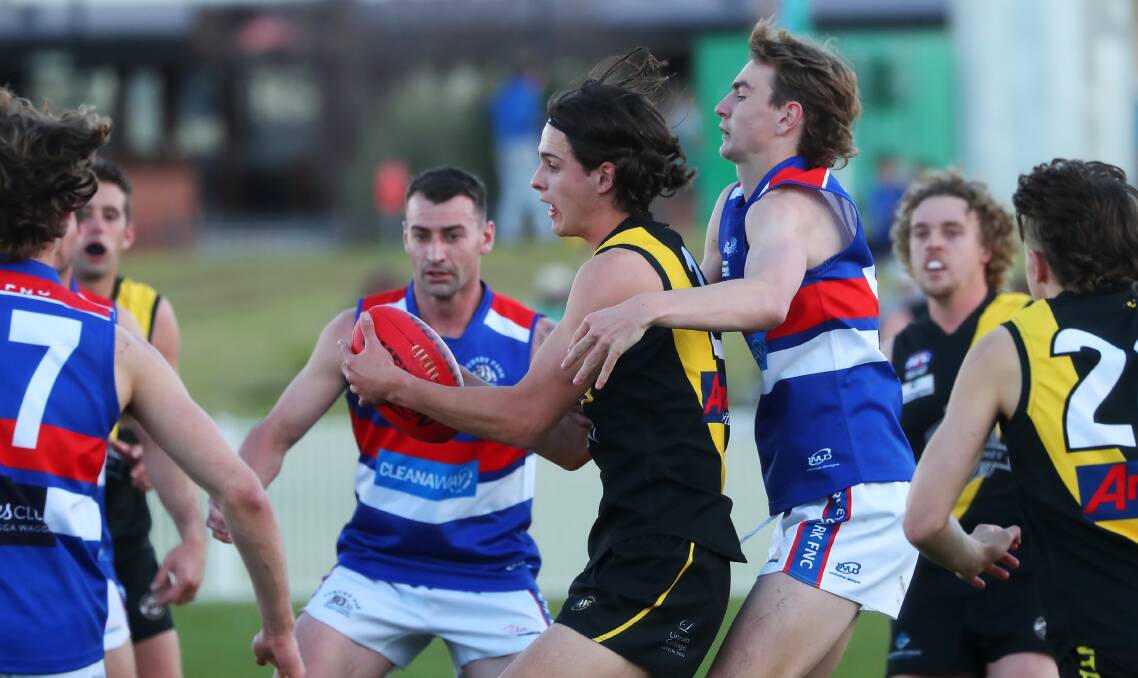 IMPORTANT WIN: Wagga Tigers' Hamish Gilmore is tackled by Turvey Park's Cooper Harmer.during the Bulldogs' win on Saturday. Picture: Emma Hillier
