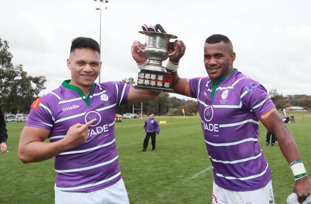 Paul Ta'avao and Seremaia Jerry Navia with the trophy. Picture: Les Smith