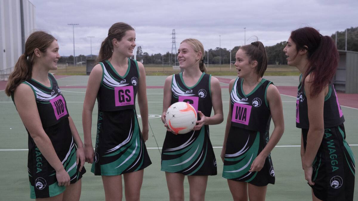 PREPARED: Wagga under-17s players Claudia Wheatley, Kate Wallace, Leila Campbell, Ava Moller and Tamsyn Goolagong catch up before this weekend's senior state titles in Sydney. Picture: Madeline Begley 