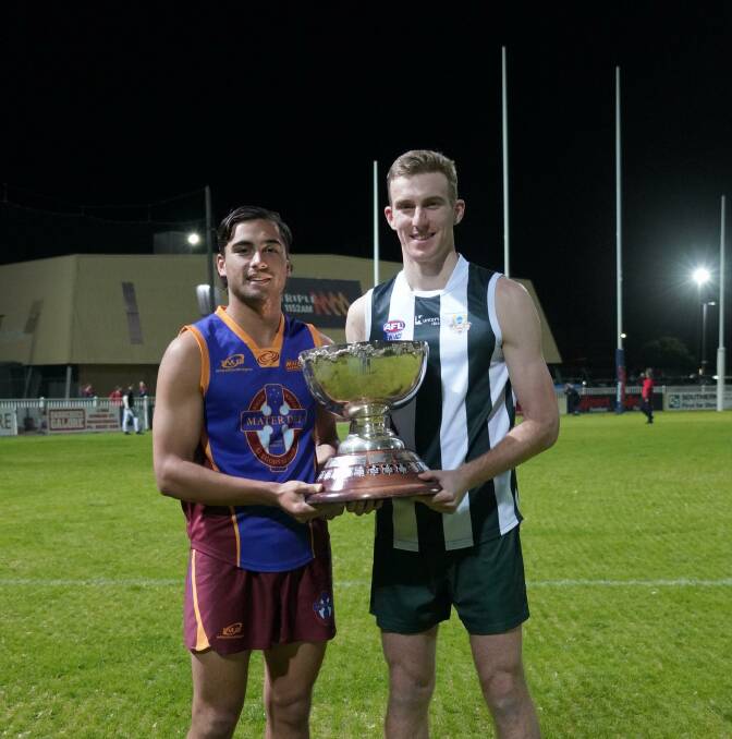 READY: Mater Dei Catholic College skipper Harry Wichman and The Riverina Anglican College opposite Billy Glanvill with the Carroll Cup before the final. Picture: AFL Riverina